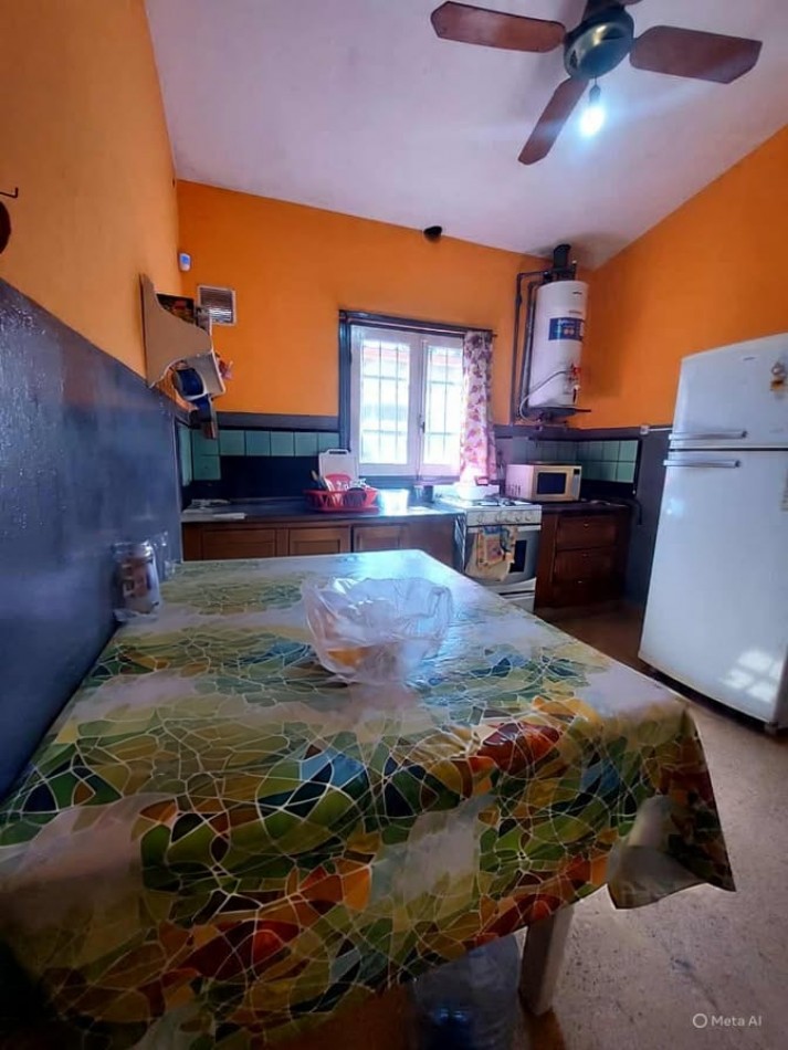 CASA MAS LOCAL A LA VENTA EN COSQUIN, SOBRE AV SAN MARTIN. CA232